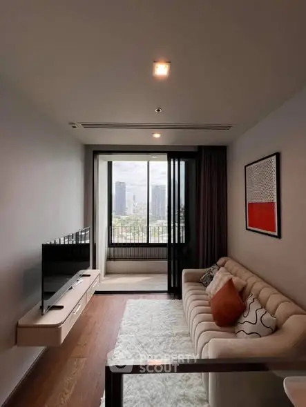 Modern living room with city view, stylish sofa, and wall-mounted TV in a high-rise apartment.