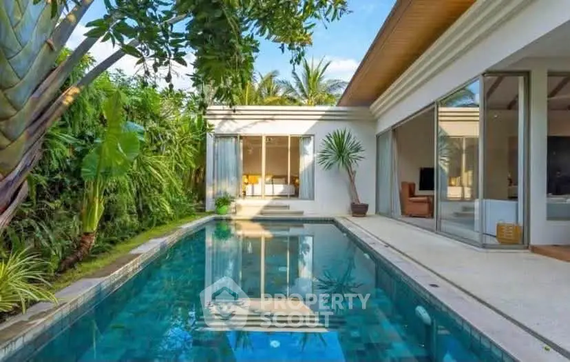 Luxurious villa with private pool and lush garden, perfect for relaxation and entertainment.