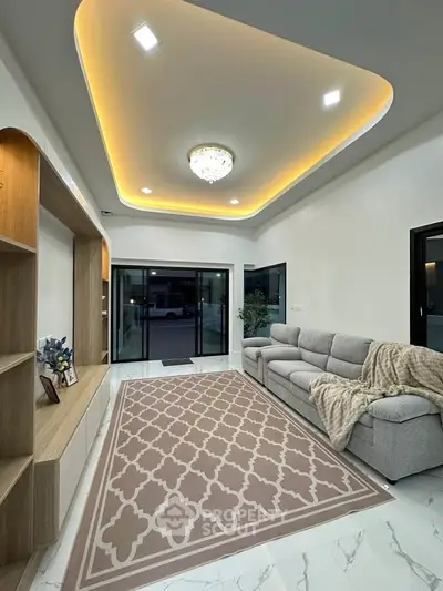 Luxurious living room with elegant ceiling lights and spacious layout