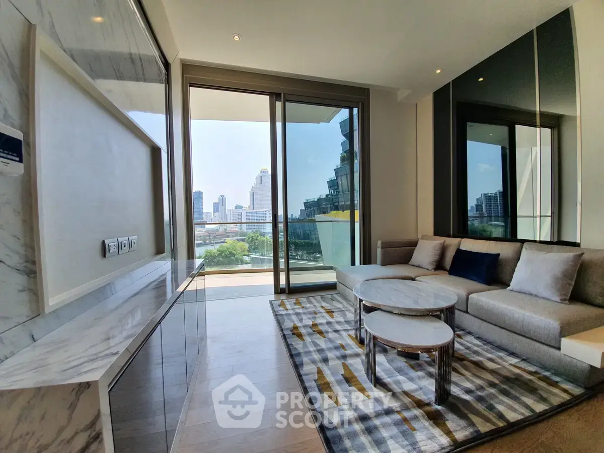 Luxurious living room with modern furniture and stunning city view from large windows.