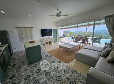 Stunning open-layout living room with panoramic views and modern decor