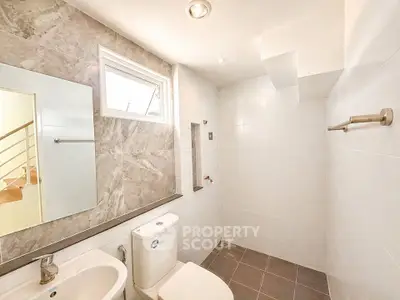 Modern bathroom with sleek design and natural light