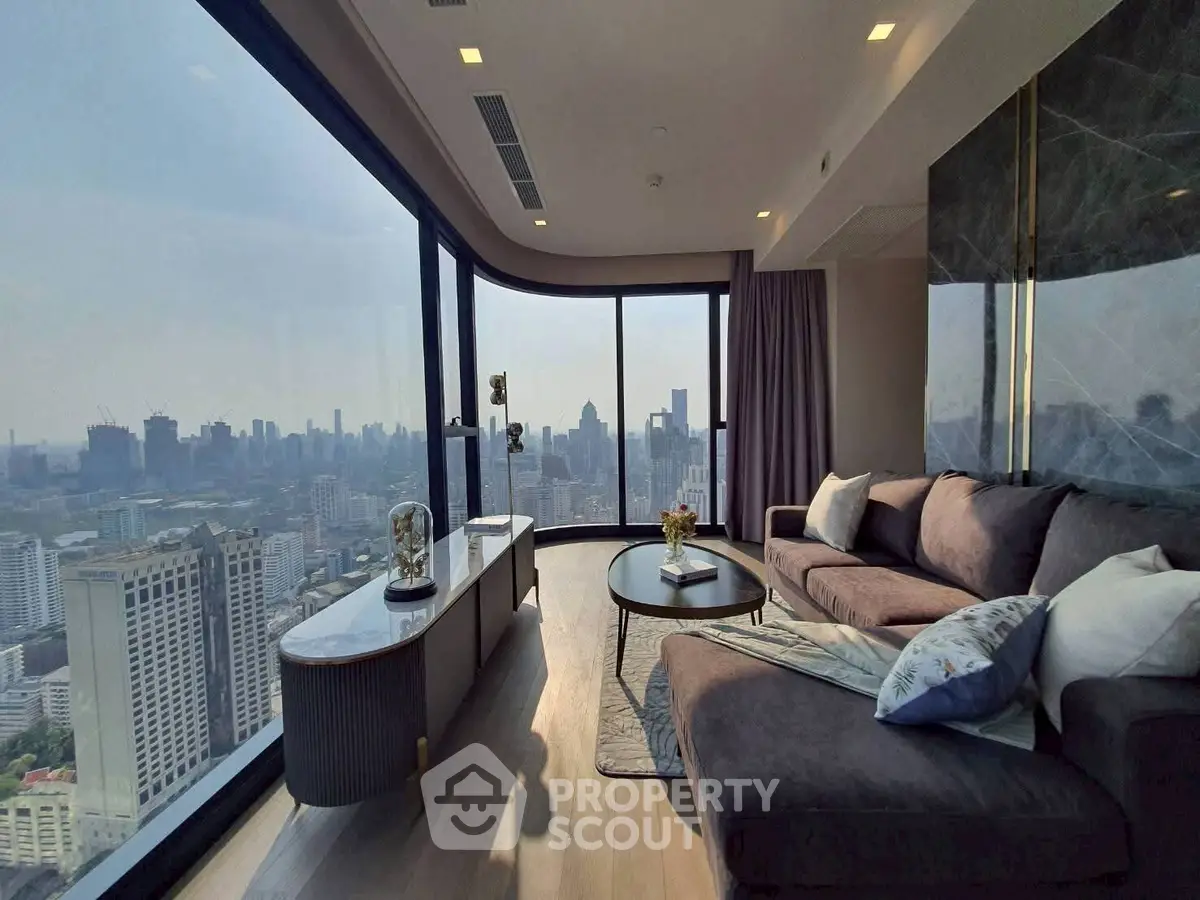 Luxurious living room with panoramic city view and modern furnishings