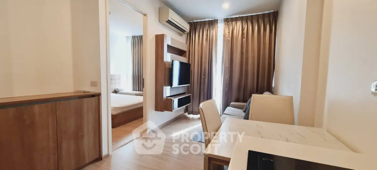 Modern apartment interior with cozy living room and bedroom, featuring stylish furniture and natural light.