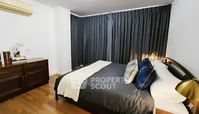 Cozy bedroom with modern decor and elegant lighting