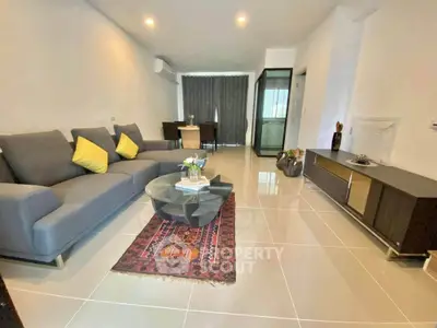 Spacious modern living room with stylish furniture and elegant decor