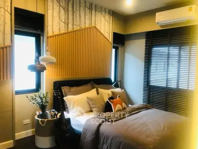 Cozy modern bedroom with stylish decor and natural light