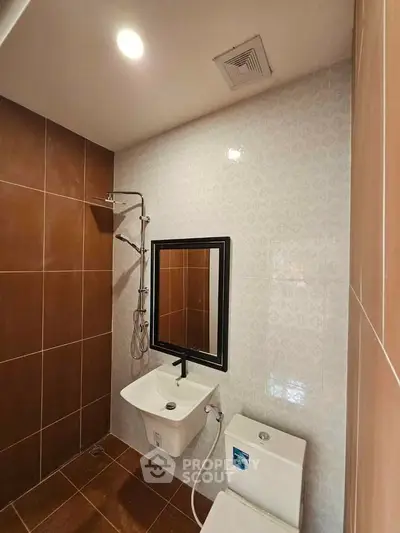 Modern bathroom with sleek fixtures and stylish tile design