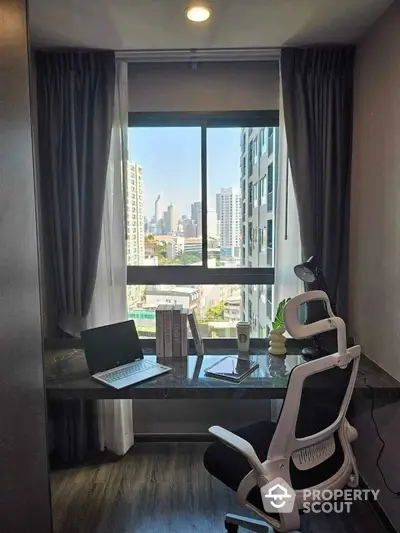 Modern study room with city view, sleek desk, ergonomic chair, and natural light.