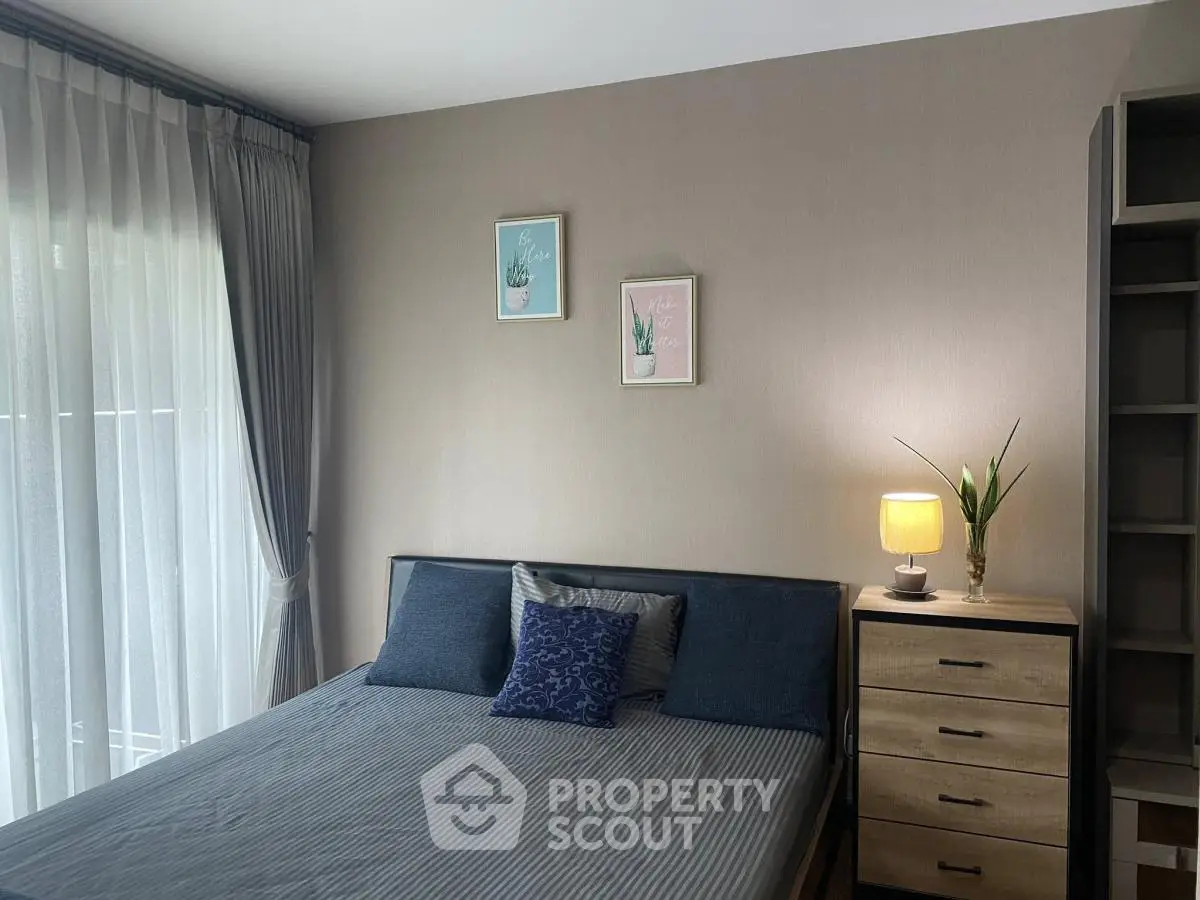 Cozy bedroom with modern decor and natural light