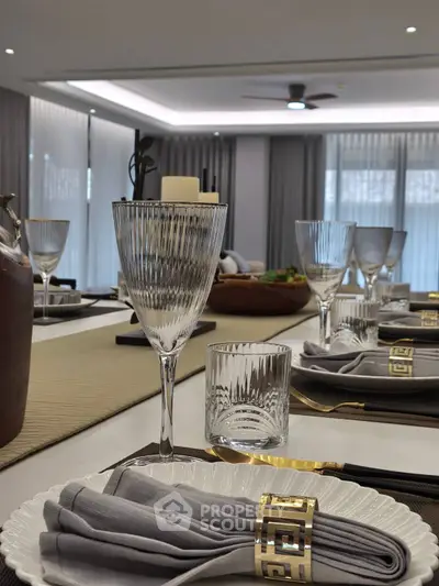 Elegant dining table setting with luxurious glassware and stylish decor