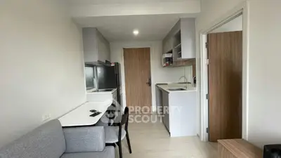 Modern compact apartment with open kitchen and cozy living area