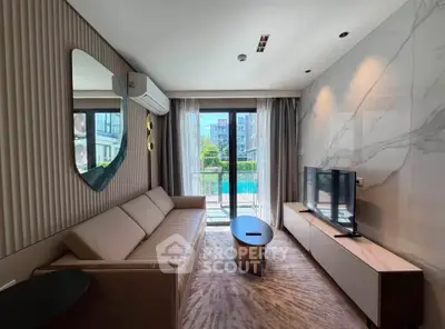 Modern living room with stylish decor and balcony view in luxury apartment