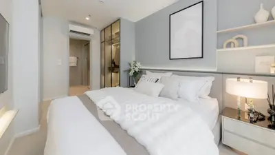 Luxurious modern bedroom with elegant decor and soft lighting