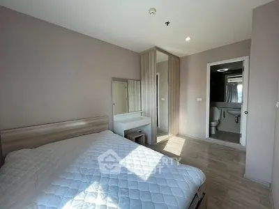Bright bedroom with ensuite bathroom and modern decor