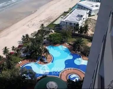 Stunning beachfront property with luxurious pool and ocean view.