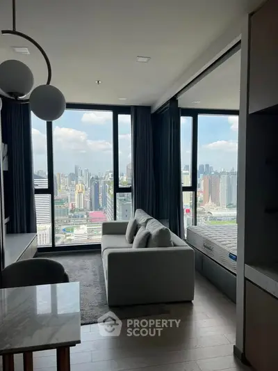 Modern living room with stunning city view and sleek furniture