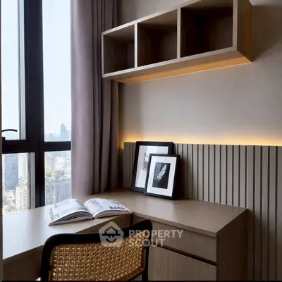 Modern study area with city view, featuring sleek desk and stylish shelving.