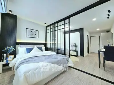 Modern bedroom with glass partition and stylish decor