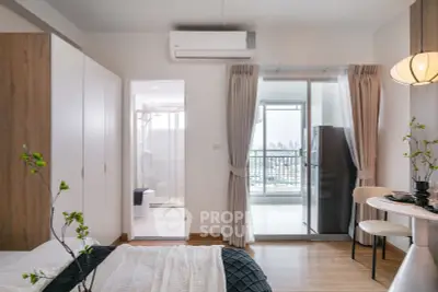 Modern bedroom with balcony view and stylish decor in urban apartment
