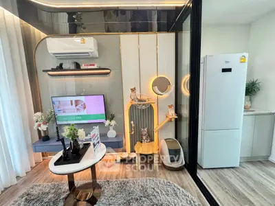 Modern living room with stylish decor, air conditioning, and a cozy cat corner, perfect for pet lovers.