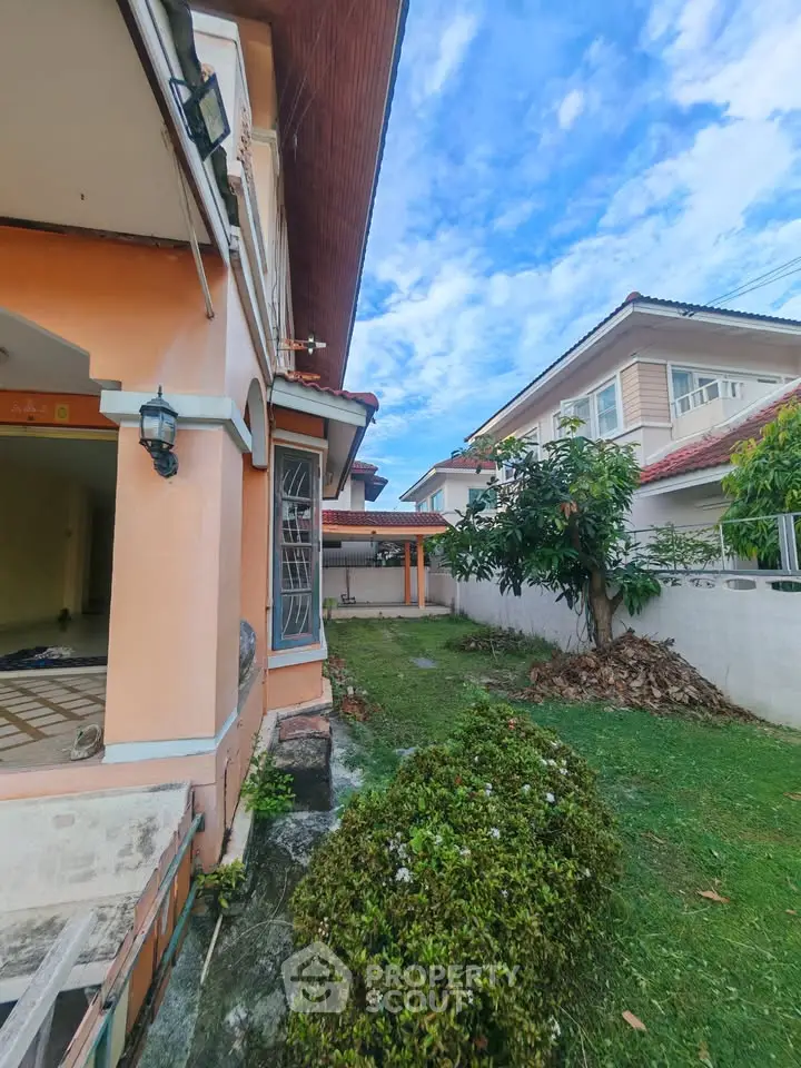 Charming suburban home with spacious garden and vibrant exterior