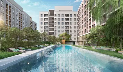 Luxurious modern apartment complex with stunning pool and lush greenery.