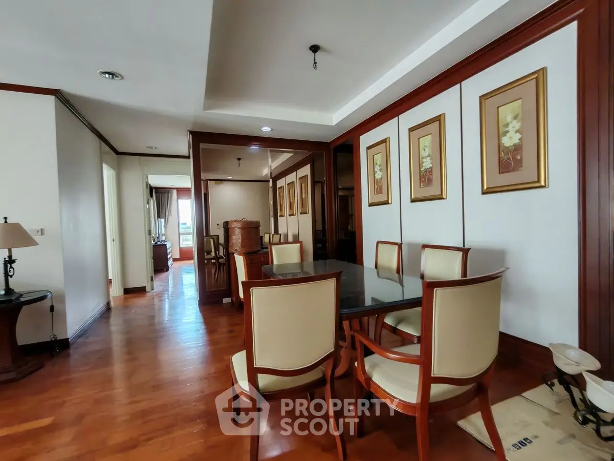 Elegant dining room with wooden flooring and classic decor