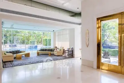 Luxurious living room with pool view and elegant decor