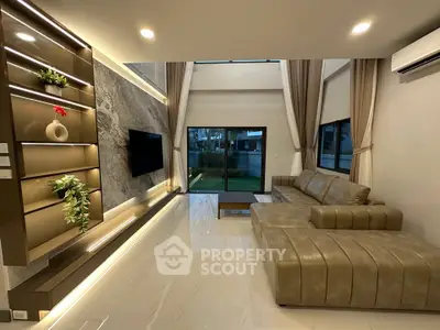 Luxurious modern living room with high ceiling and elegant decor