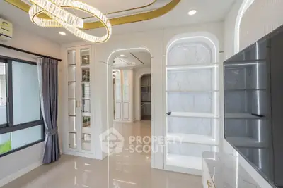 Luxurious modern living room with elegant lighting and marble accents