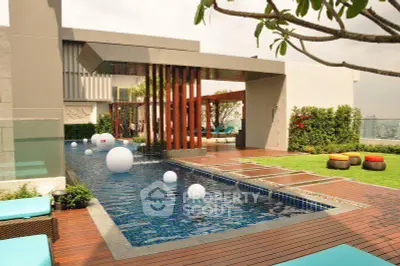 Luxurious rooftop pool with modern design and city views, perfect for relaxation and entertainment.