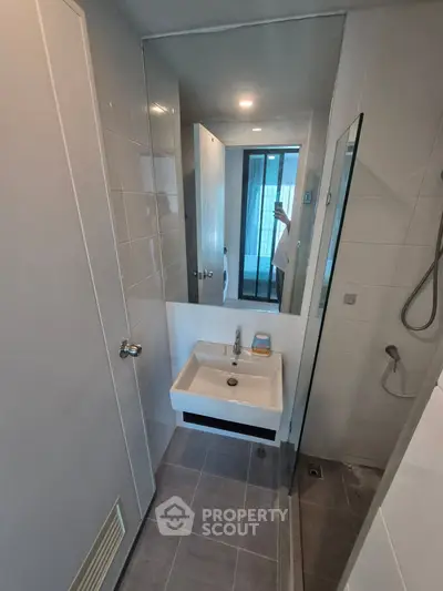 Modern bathroom with sleek design and glass shower enclosure