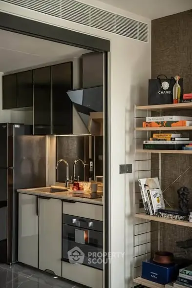 Modern kitchen with sleek design and open shelving, featuring built-in oven and stylish decor.
