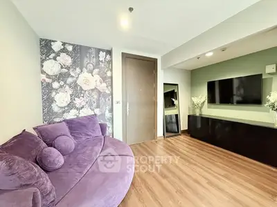 Stylish living room with floral accent wall and modern decor