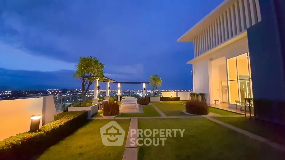 Stunning rooftop garden with panoramic city views at dusk