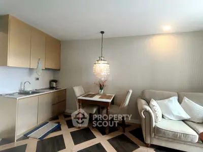 Chic modern living room with open kitchen and elegant dining area