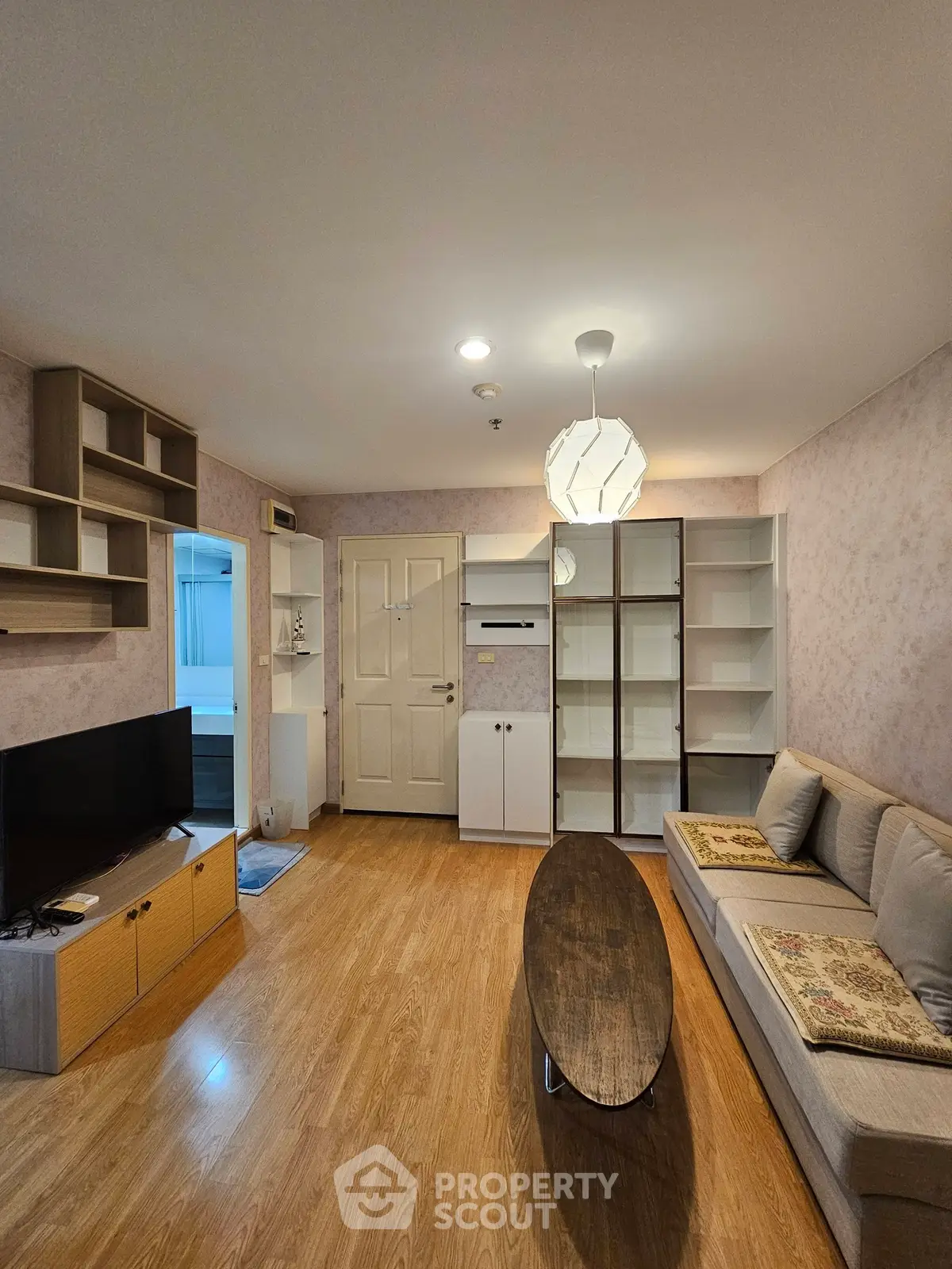 Cozy living room with modern furniture and wooden flooring