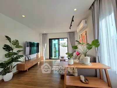 Spacious modern living room with stylish decor and natural light