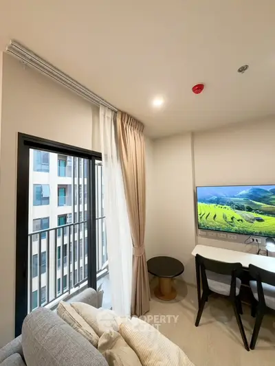 Modern living room with balcony view and stylish decor