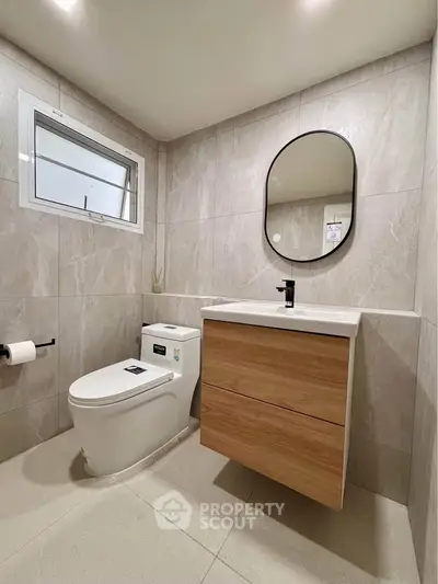 Modern bathroom with sleek fixtures and elegant tile design