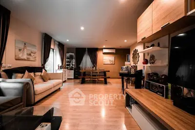 Spacious modern living room with elegant decor and ample natural light