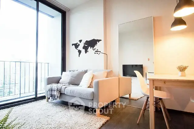 Modern living room with cozy sofa and city view balcony