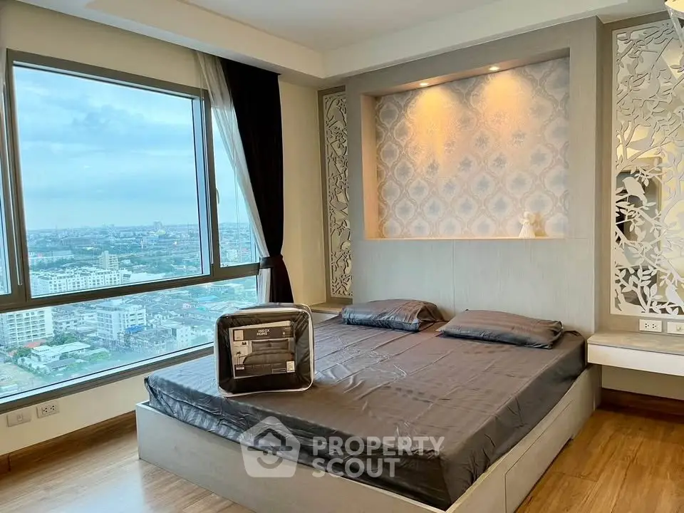 Luxurious bedroom with stunning city view and elegant decor