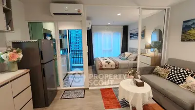 Modern studio apartment with cozy living area and stylish bedroom
