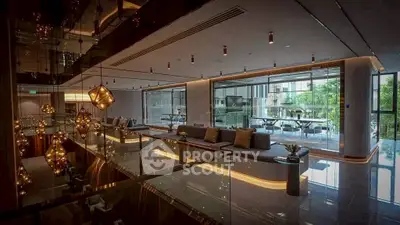 Luxurious modern living room with elegant lighting and glass balcony view