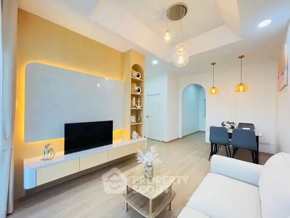 Modern living room with stylish decor and dining area