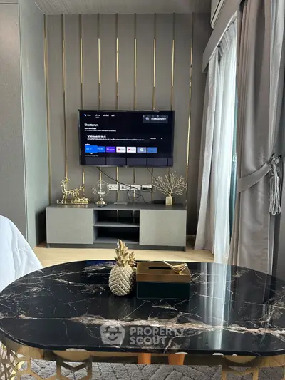 Modern living room with sleek TV setup and elegant decor