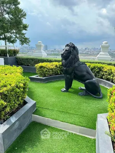 Luxurious rooftop garden with stunning city view and elegant lion statue