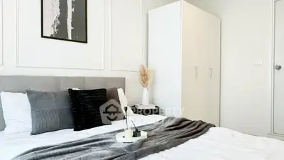 Modern bedroom with stylish decor and cozy ambiance